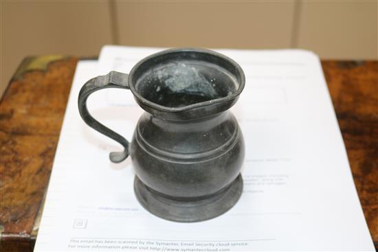 Five graduated pewter tankards, tallest 17cm